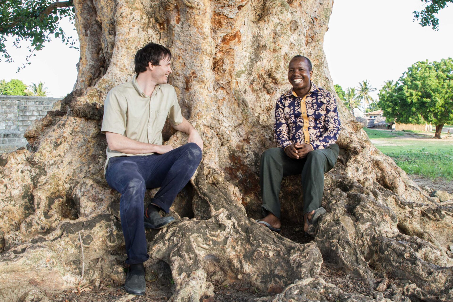Daimen Hardie sits at the bottom of a tree with CFP's Executive Director.