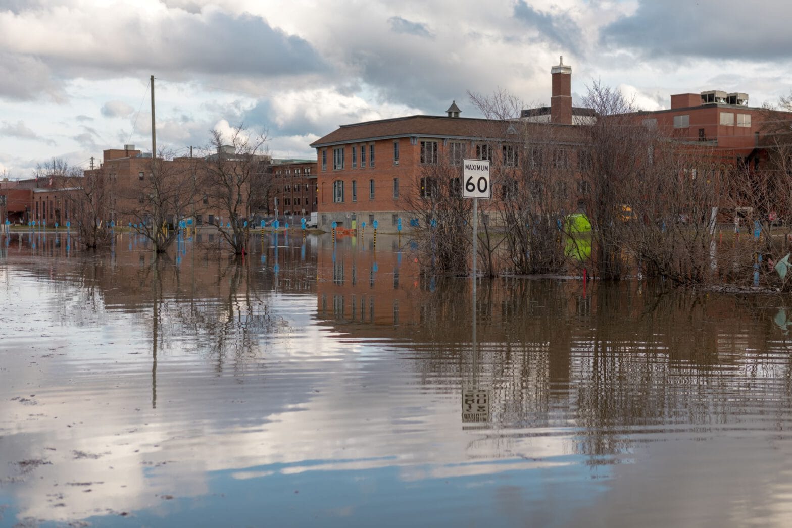 Flooded streets with red building in background